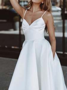 Elegant white satin V-neck maxi dress with spaghetti straps and beaded waist belt