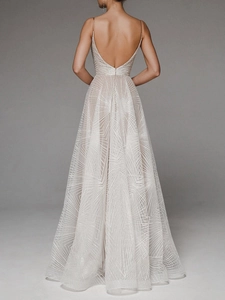 Detailed back view of a sleeveless open back evening dress with sequin embroidery texture