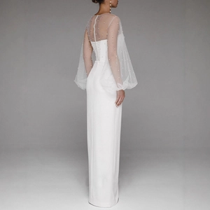 Elegant white strapless column dress featuring sheer puff sleeves with pearl embellishments