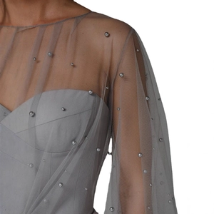 Grey off-the-shoulder party dress with sheer tulle overlay and elegant pearl embellishments