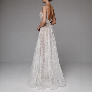 Elegant silver A-line evening dress with spaghetti straps and sequined geometric patterns