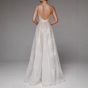 Elegant champagne backless evening gown with silver geometric sequins and thin straps
