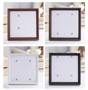 Collage of square 4-inch picture frames in walnut, dark wood, white, and black finishes