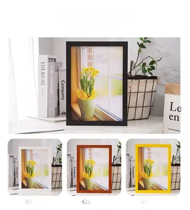 Minimalist rectangular photo frames in black, white, walnut, and yellow wood finishes