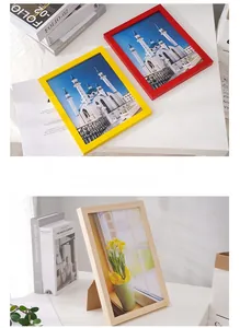 Detail view of colorful pine wood frames in red and yellow for modern home decor