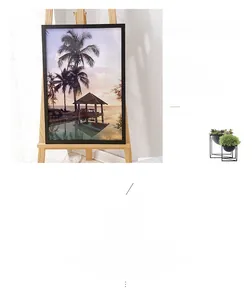 Close-up of a 16-inch solid wood frame featuring a tropical beach sunset art piece