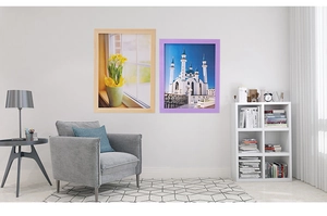 Detail of wooden wall frames showing a green plant and mosque architecture in a modern living room