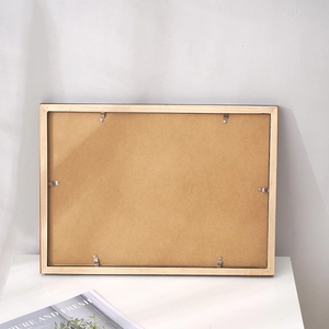 Rear view of minimalist pine wood photo frame with durable MDF back and metal clips