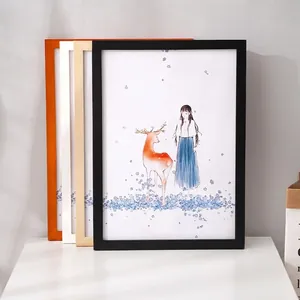 Minimalist pine wood picture frame set in black, natural, white, and orange finishes