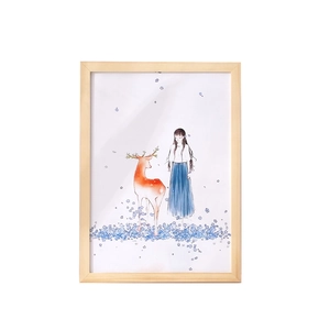 Minimalist pine wood frame featuring a watercolor girl and deer illustration in blue flowers