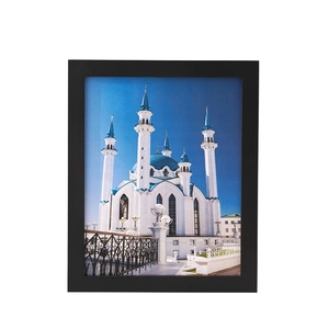 Minimalist black solid wood photo frame featuring a scenic architecture art print