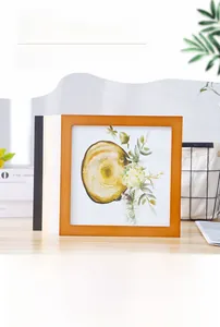 Detail view of square solid wood picture frames in multiple colors for home decor
