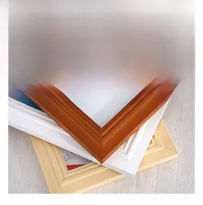 Detail showing natural wood grain textures in brown, white and oak finish frames