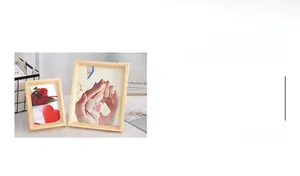 Close-up of minimalist solid wood photo frames in natural finish for home decor
