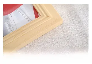 Detail of light natural wood photo frame showing smooth finish and organic grain texture
