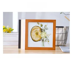 Detailed close-up of Nordic style wooden picture frames with natural grain textures