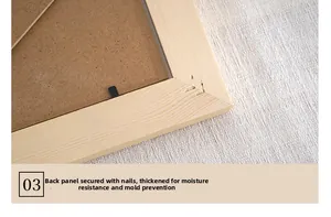 Detail of solid wood photo frame back with metal tabs and moisture-proof backing