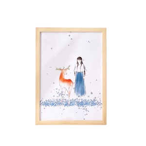 Natural pine wood picture frame with illustrated girl and deer artwork display