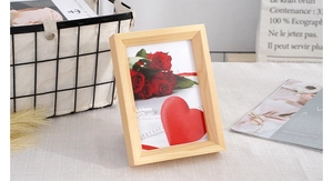 Close-up of Nordic style solid wood photo frame featuring natural wood grain and textures