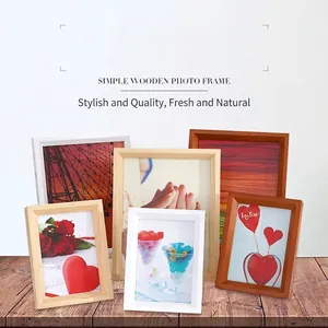 Minimalist solid wood picture frames in white, natural, and walnut finishes, multiple sizes