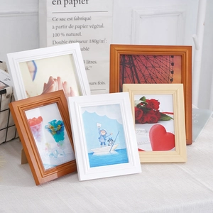 Minimalist Nordic style wooden photo frames in white and oak finishes for home decor