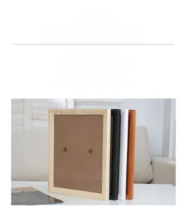 Macro detail of high-quality solid wood frames showing thick texture and metal back clips