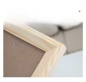 Detail of solid wood frame corner showing smooth polished texture and natural grain finish