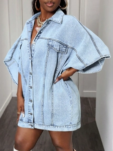 Oversized light blue wash denim shirt jacket with batwing sleeves and metal buttons