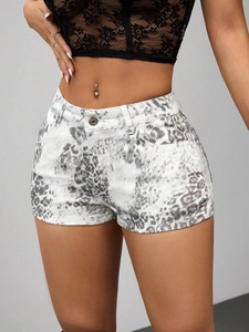 Women's leopard print denim shorts in grey and white with mid-waist cut and pockets