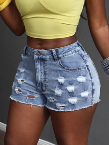 Women high waisted distressed denim shorts in light blue wash with frayed hem and ripped details