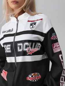 Close-up of racer jacket featuring Speed Club prints and vintage athletic embroidery