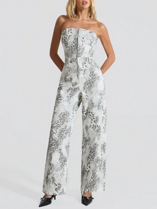 Detailed full-view of a strapless leopard print jumpsuit with metallic front buttons
