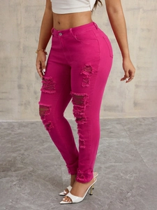 Slim fit high waist hot pink distressed jeans with ripped tassel details for women
