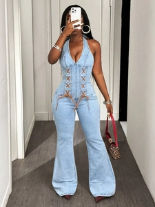 Slim fit halter neck denim jumpsuit in light blue wash with crisscross waist ties