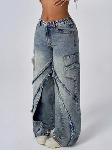 Loose high waist light blue denim jeans with frayed patchwork layers and cargo pockets