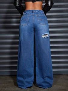 Jean femme taille haute à jambes larges avec déchirure effet délavé vue arrière