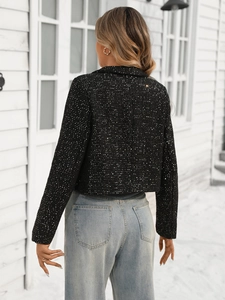 Women black tweed jacket with silver sequins and cropped fit shown in a winter scene