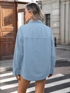 Women's light blue long sleeve denim shirt jacket with drop shoulders and lapel collar