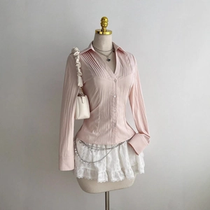 Pale pink long-sleeved women shirt with pleat details and elegant V-neck design