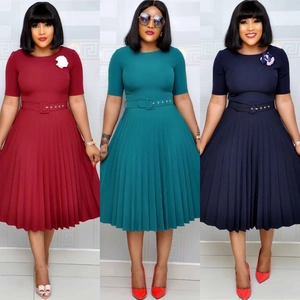 Three-color pleated midi dresses in dark red, teal, and navy with matching belts