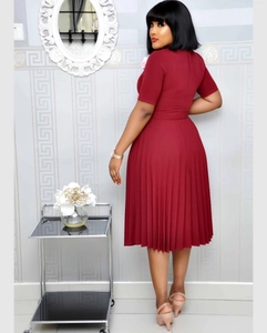 Detailed back view of wine red short sleeve pleated dress with high waist design