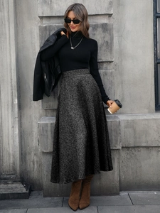 Women wool A-line skirt with metallic shimmer and black turtleneck knit sweater set