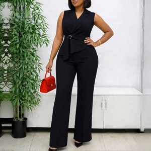 Detail view of the black sleeveless jumpsuit with V-neck and metal buckle waist tie belt