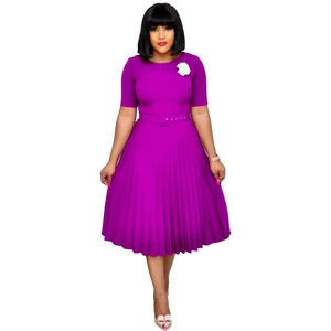 Short sleeve pleated purple dress with round neck, matching belt and white rose brooch