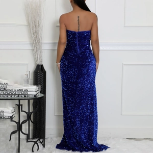 Rear view of elegant sequined royal blue off-shoulder floor-length evening gown