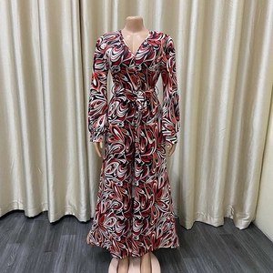 Fashionable V-neck long sleeve wide leg jumpsuit with red and white abstract geometric print