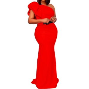 Macro detail of red one-shoulder evening gown featuring layered ruffle and black waist belt