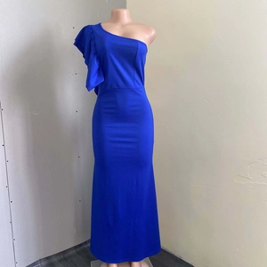 Detail of the ruffle shoulder design on an asymmetric royal blue formal maxi dress
