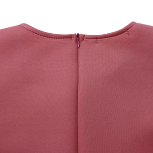 Close-up of elegant dark pink dress showing round neckline and invisible zipper detail