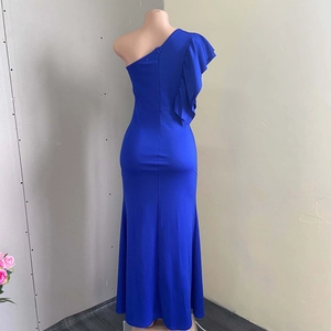 Detail of elegant navy one-shoulder evening gown with layered ruffles and back zipper closure